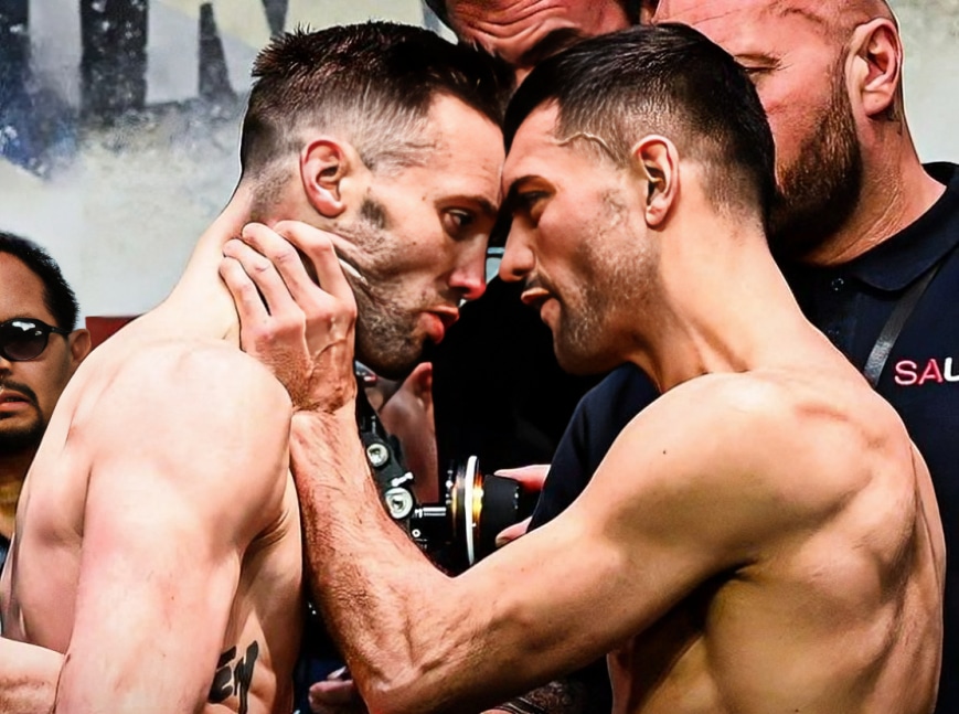 JOSH TAYLOR A LA IZQUIERDA Y JACK CATTERALL A LA IZQUIERDA, CARA A CARA TRAS EL PESAJE DE LA PRIMERA PELEA